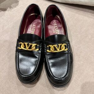 Valentino Black Leather Loafers with Gold Logo Chain Accent